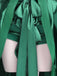 Costume ispirato a Mercoledì Agnes in raso verde anni '50