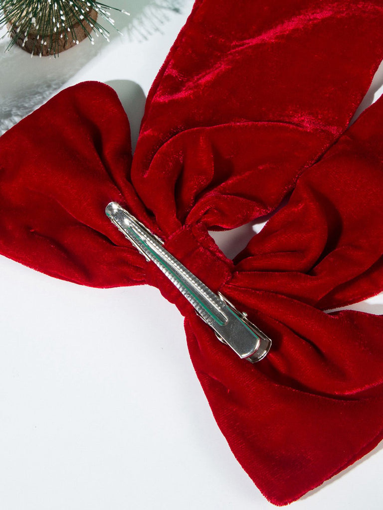 Forcina per capelli con fiocco grande in velluto natalizio