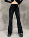 Pantaloni bootcut in velluto con stampa punk anni '80