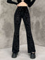 Pantaloni bootcut in velluto con stampa punk anni '80