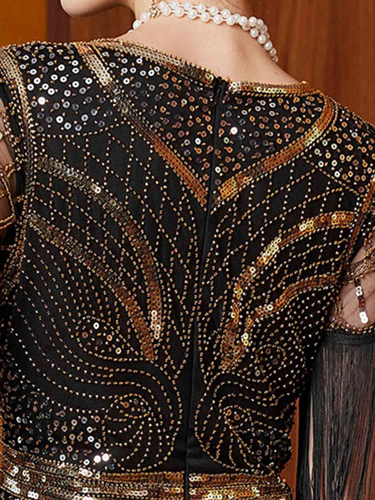 Abito lungo in paillettes e nappe con scollo a V oro anni '20