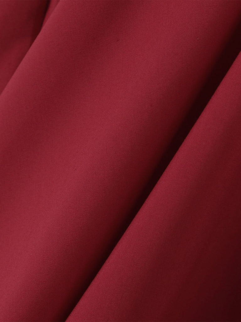 Abito con maniche a sbuffo e lacci rosso anni '60