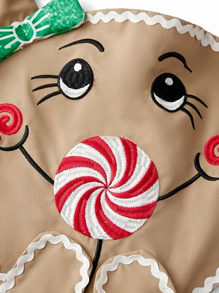 Vestito grembiule con lecca-lecca e pan di zenzero marrone anni '40