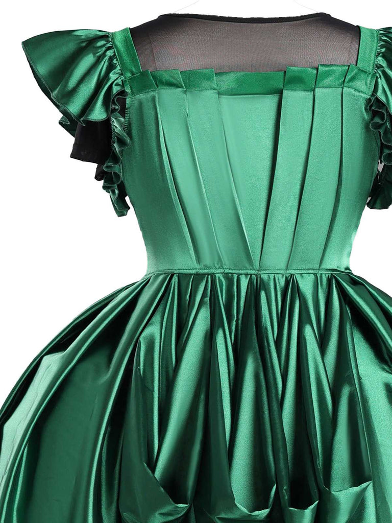 Costume ispirato a Mercoledì Agnes in raso verde anni '50