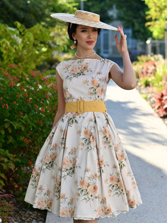 Abito floreale antico giallo con scollo a barca anni '50