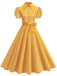 Abito-a-ruota-giallo-anni '50-a-pois-con-colletto-a-camicia-e-cintura