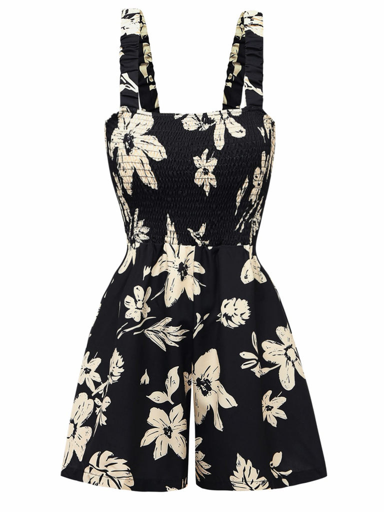 Black Romper with white floral pattern on a white background