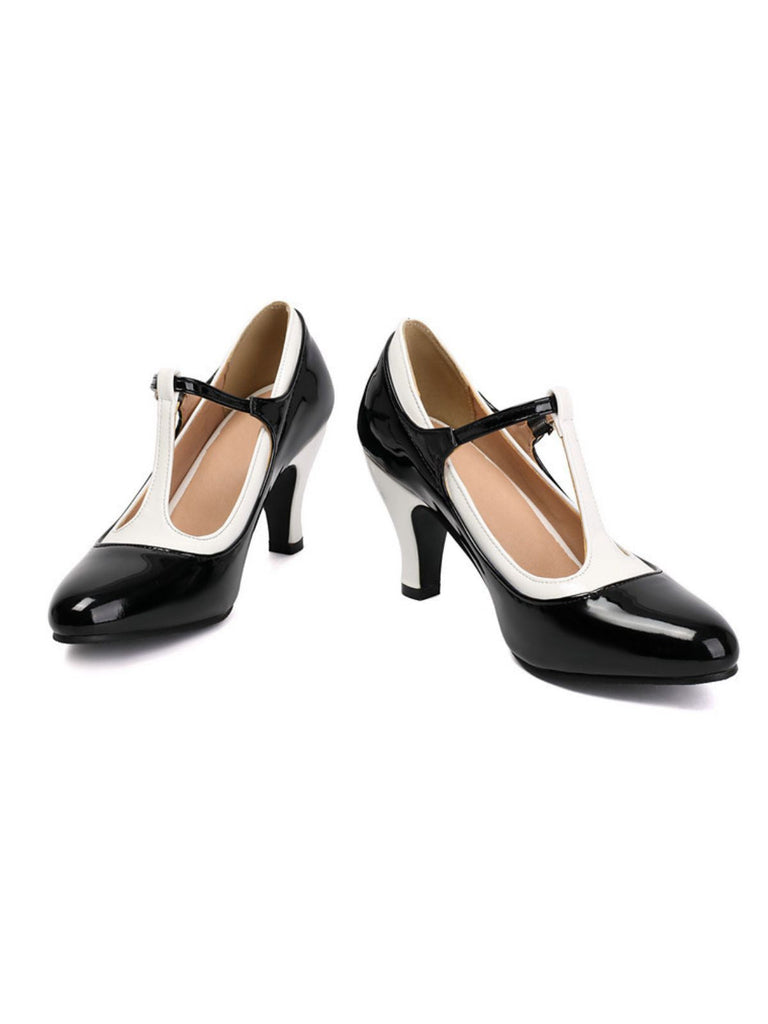 Black and white high-heeled shoes on a white background