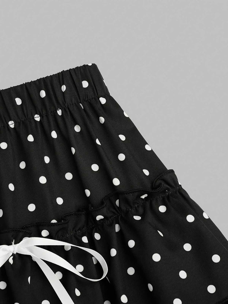 Black polka dot mini skirt waist detail with lace ruffle design