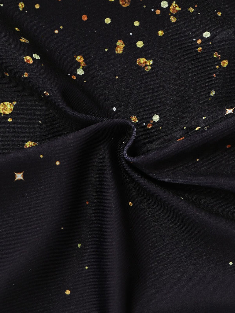 Black fabric with gold and silver star patterns