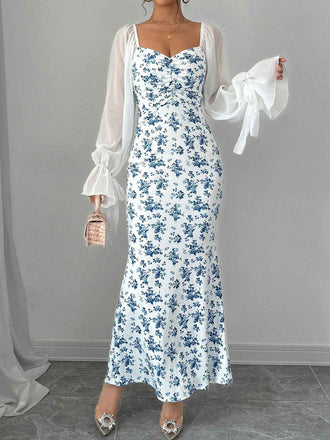 She slips into this Blue 1930s Chiffon Sleeves Ditsy Floral Dress and suddenly it's a 1930s daydream