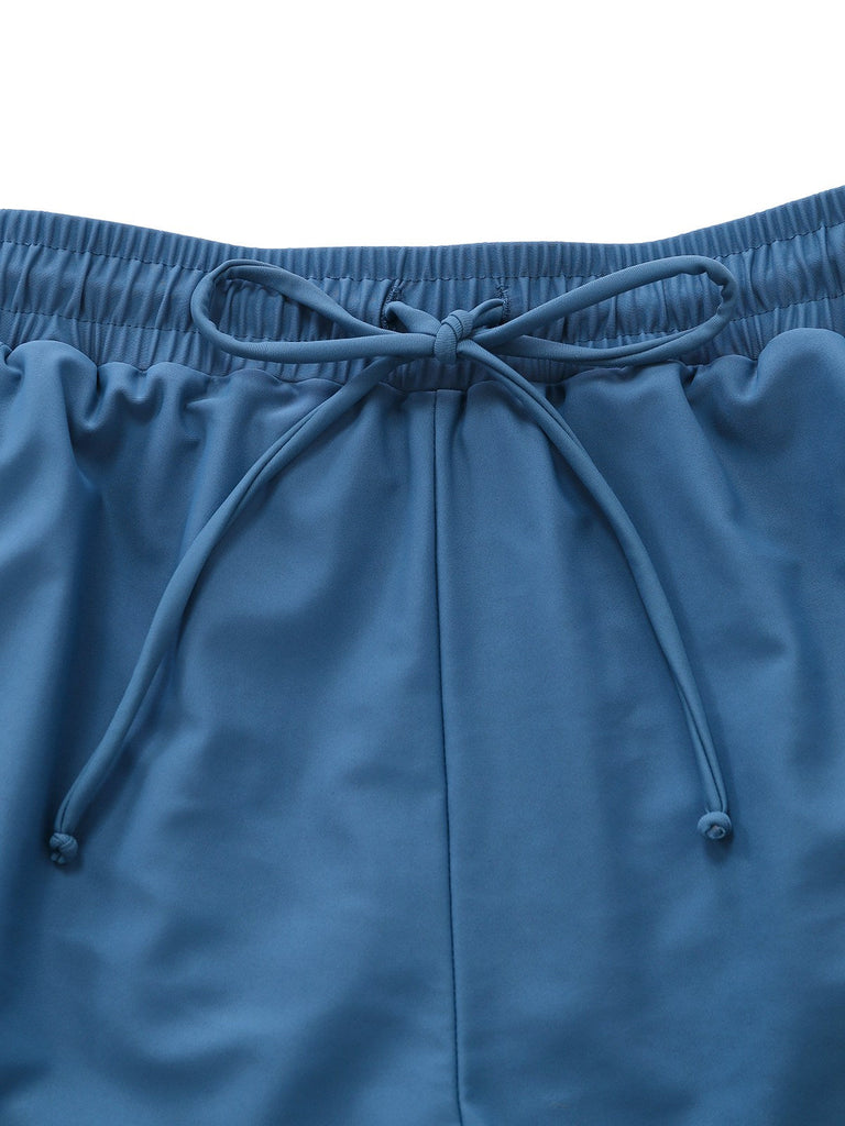 Costumi intero blu anni '40 a righe con tasche arricciate