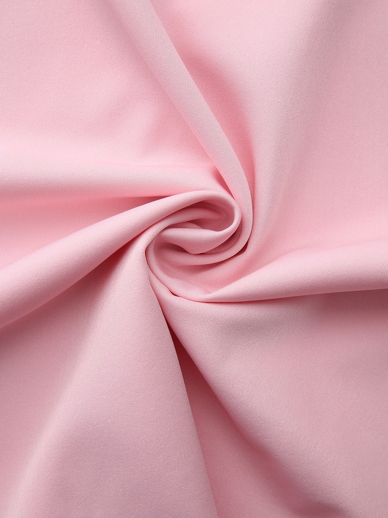 Abito con mantella e revers a tinta unita anni '50