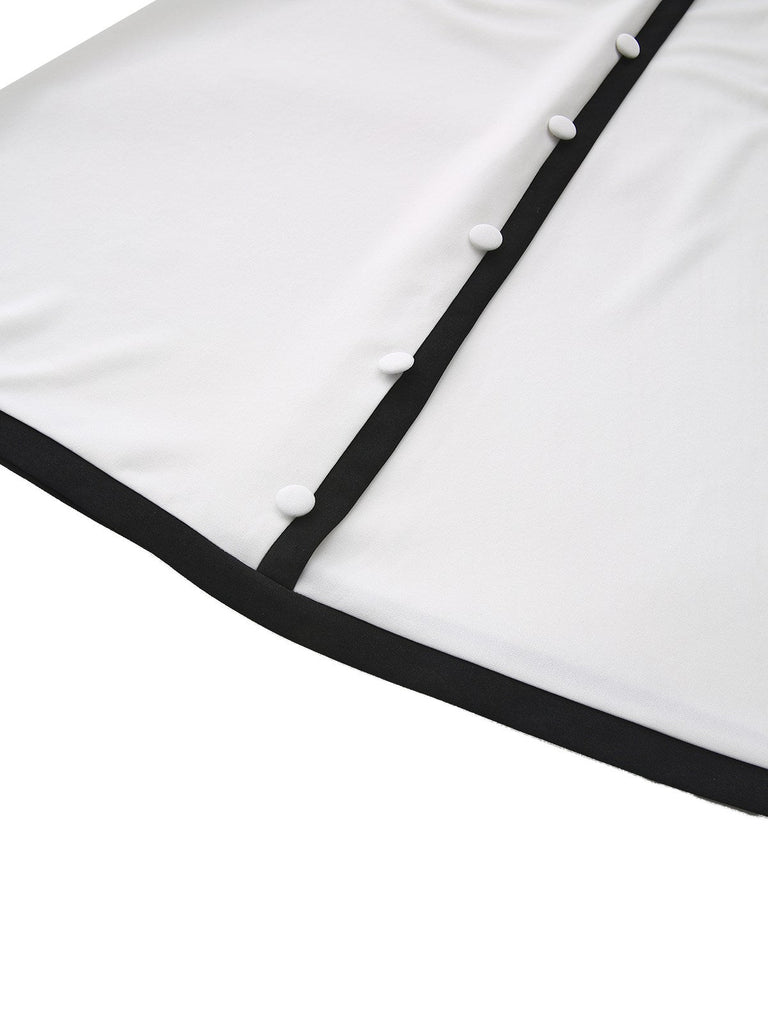 Abito con scollo a V profondo e bottoni a intaglio bianco e nero anni '40