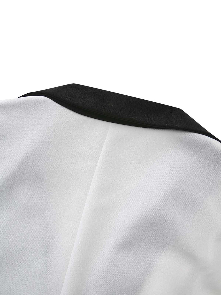 Abito con scollo a V profondo e bottoni a intaglio bianco e nero anni '40