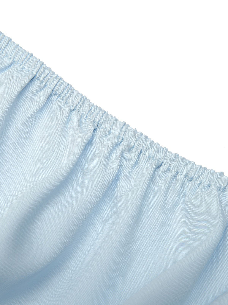 Top maniche a sbuffo in tinta unita azzurro cielo anni '50