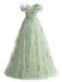 Green floral embroidered dress on a white background
