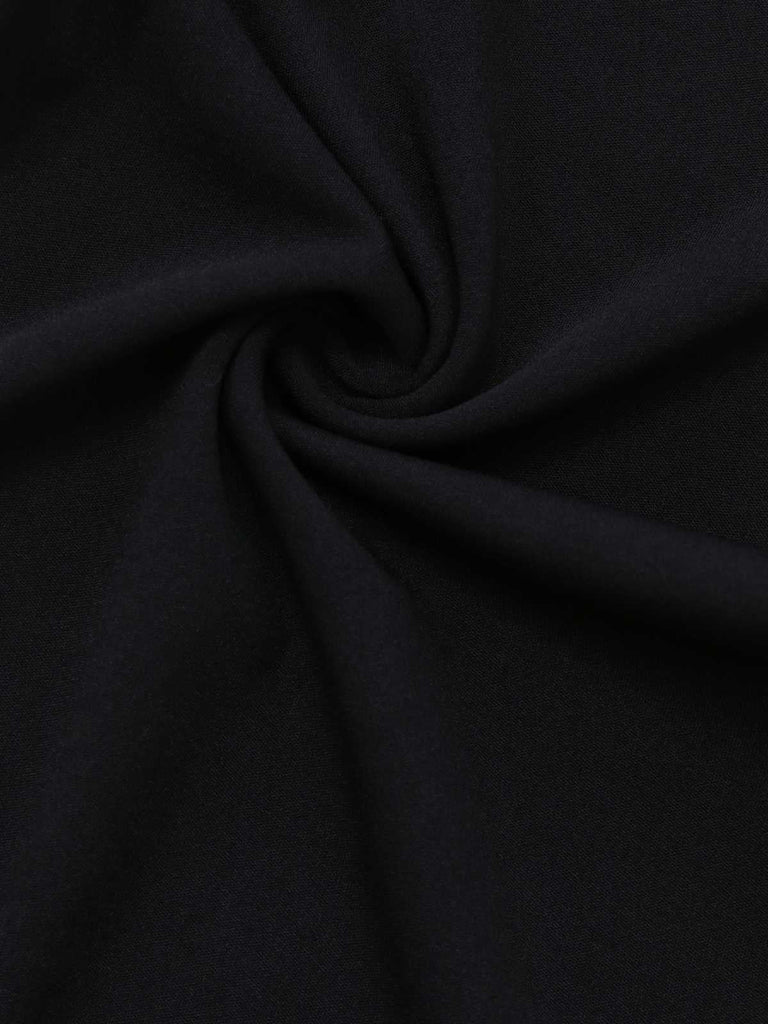 Tuta lunga spalle scoperte a contrasto con scollo a V profondo anni '70