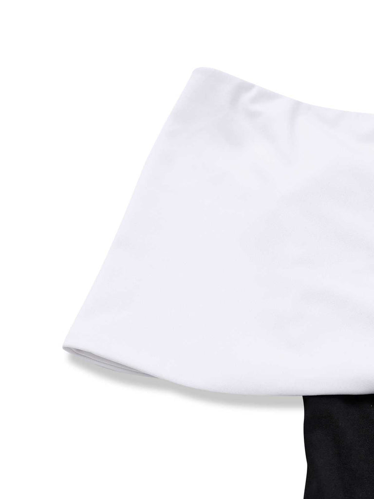 Tuta lunga spalle scoperte a contrasto con scollo a V profondo anni '70