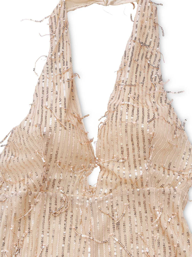 Tuta lunga con frange di paillettes e scollo a V anni '70