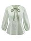 Camicetta con maniche a sbuffo e collo annodato verde anni '80