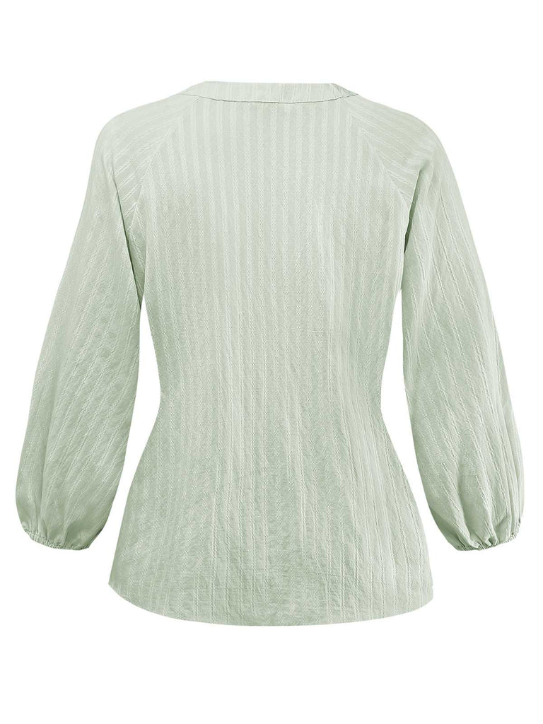 Camicetta con maniche a sbuffo e collo annodato verde anni '80