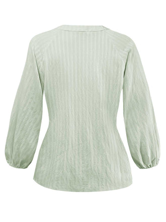 Camicetta con maniche a sbuffo e collo annodato verde anni '80