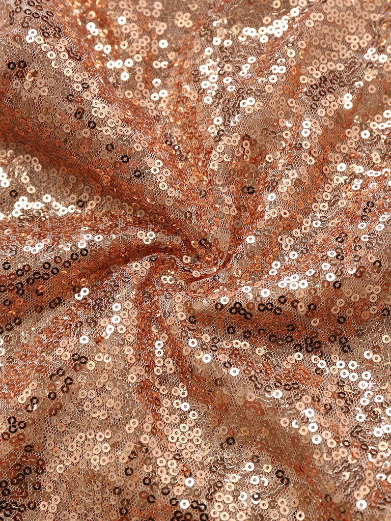 Tuta corta con paillettes con scollo a V anni '60