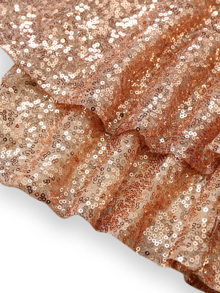 Tuta corta con paillettes con scollo a V anni '60