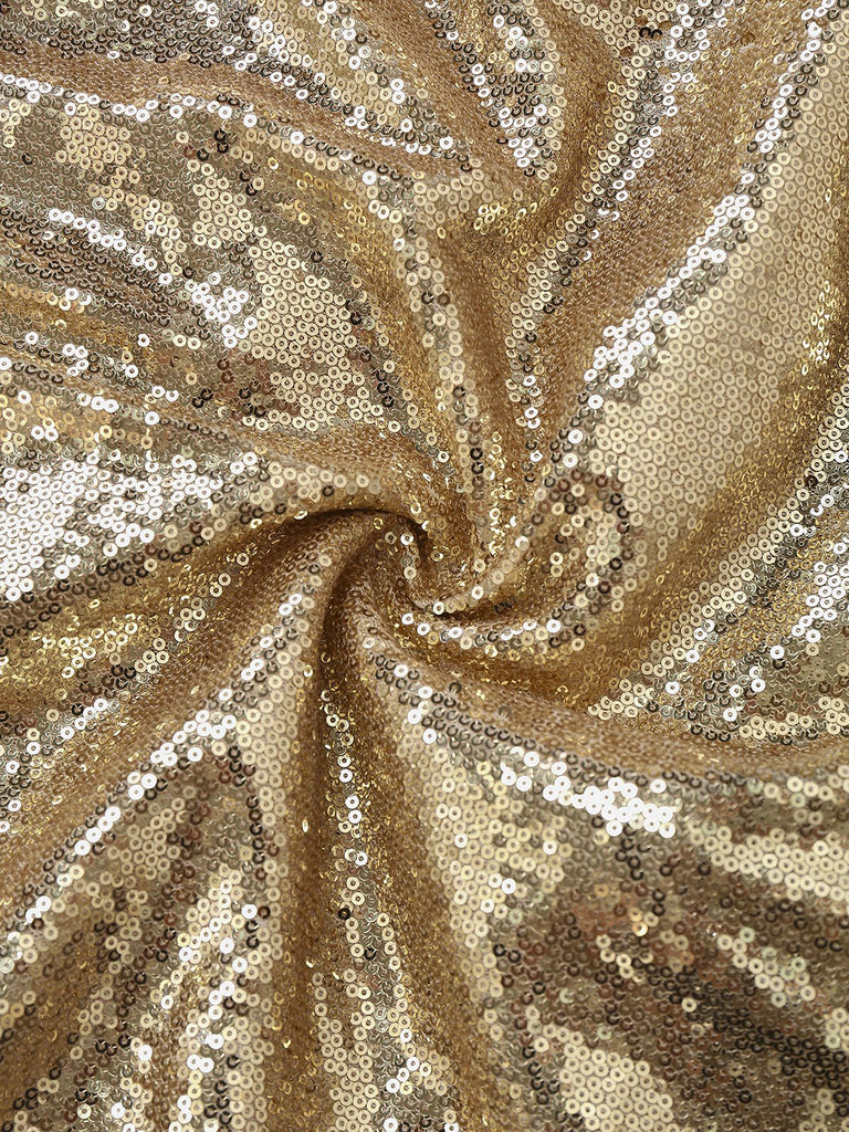 Abito da sera in paillettes con spalle scoperte oro anni '80