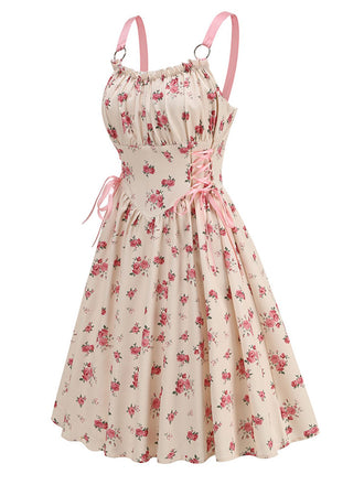 Abito a ruota con lacci e fioreale rosa anni '50