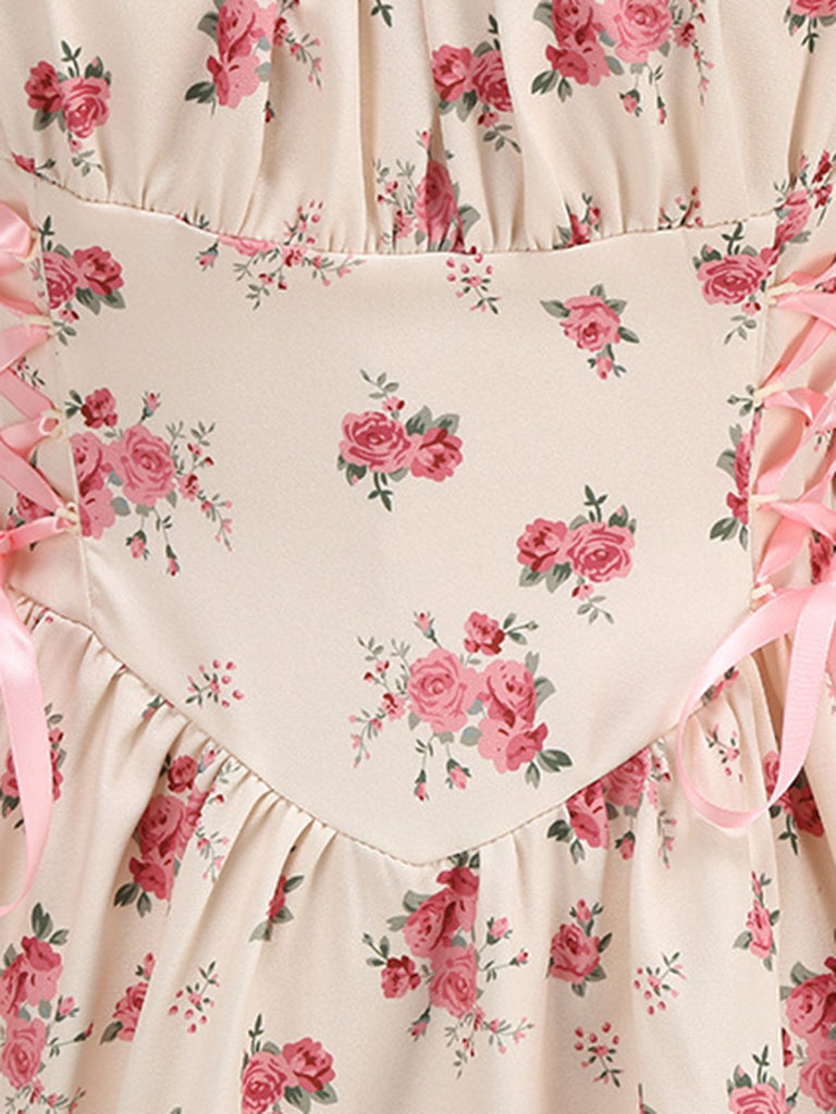 Abito a ruota con lacci e fioreale rosa anni '50