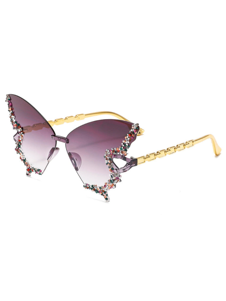 Sunglasses with floral embellishments on a white background