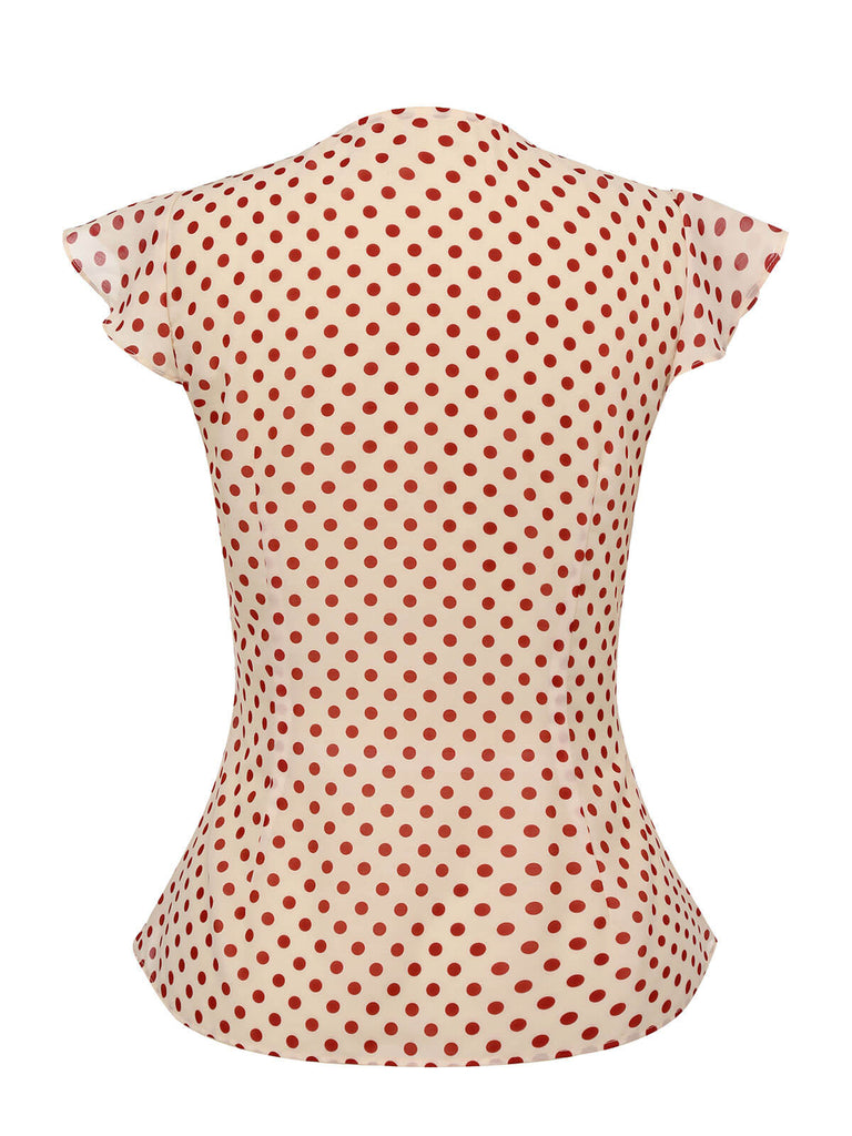 Camicetta a pois con maniche a palloncino rosso anni '50