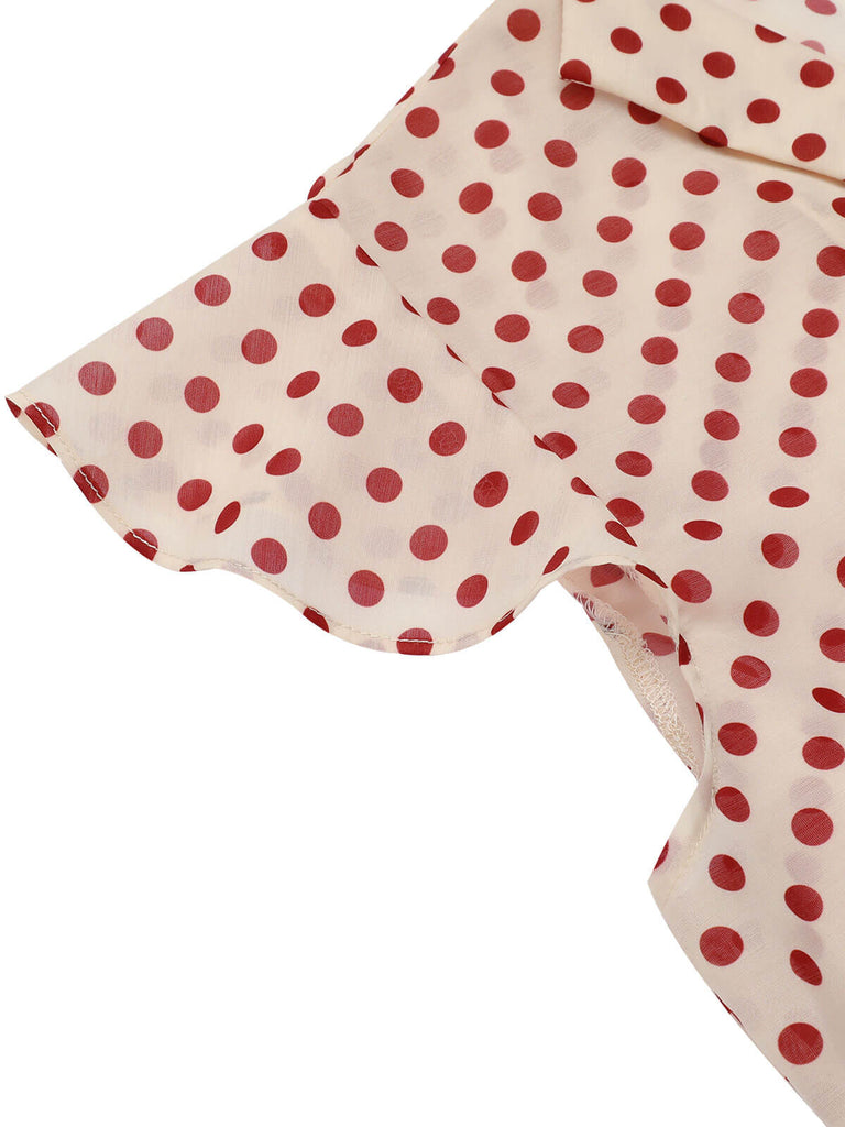 Camicetta a pois con maniche a palloncino rosso anni '50