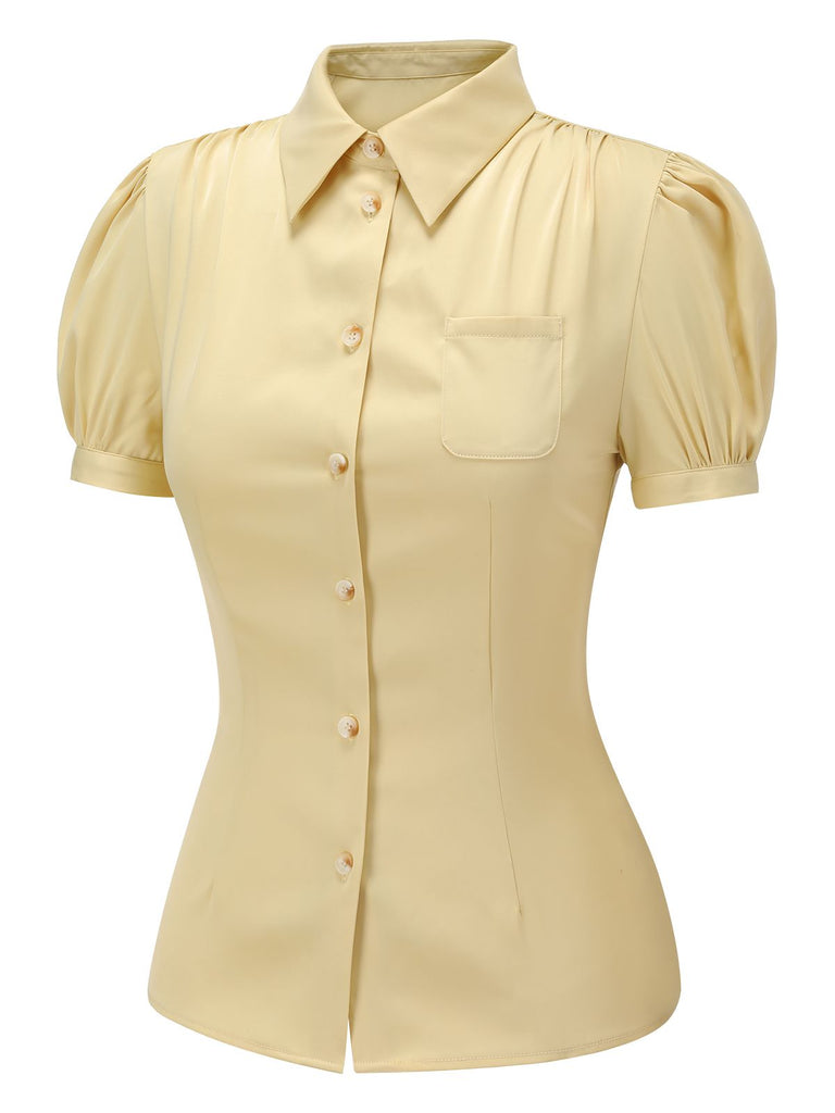 Camicetta con maniche a sbuffo e revers giallo anni '40