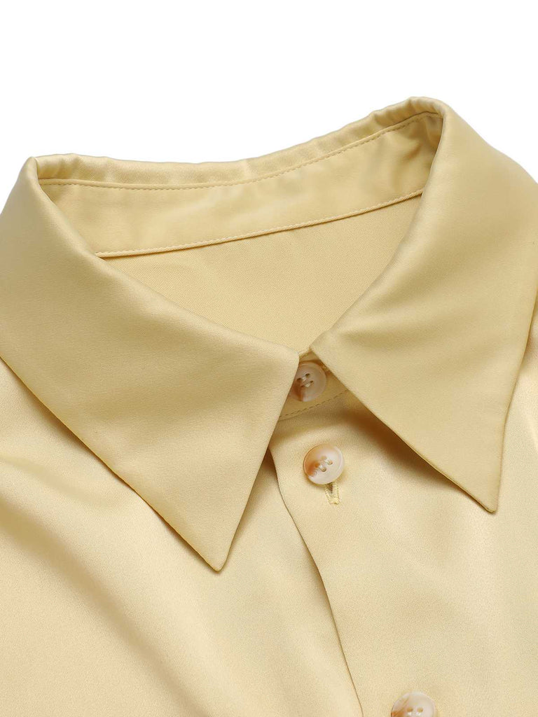 Camicetta con maniche a sbuffo e revers giallo anni '40