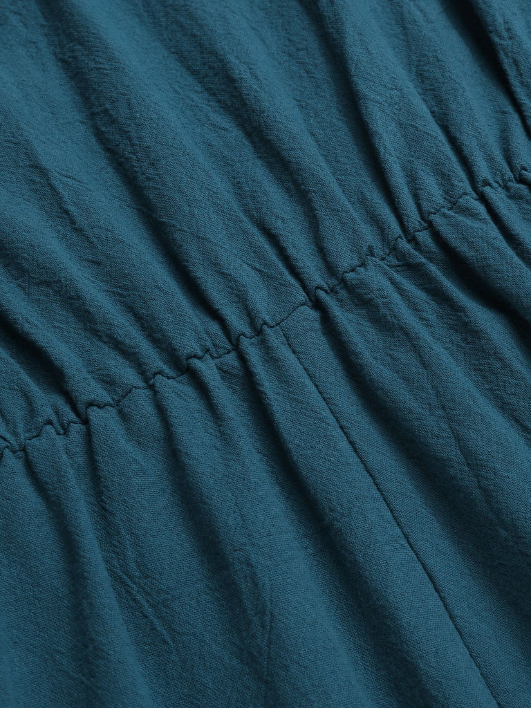Tuta corta in cotone e maniche a balze scollo a V blu anni '50