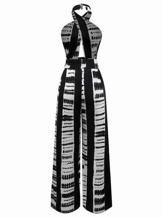 Tuta lunga con incrocio e macchie d'inchiostro nero anni '30