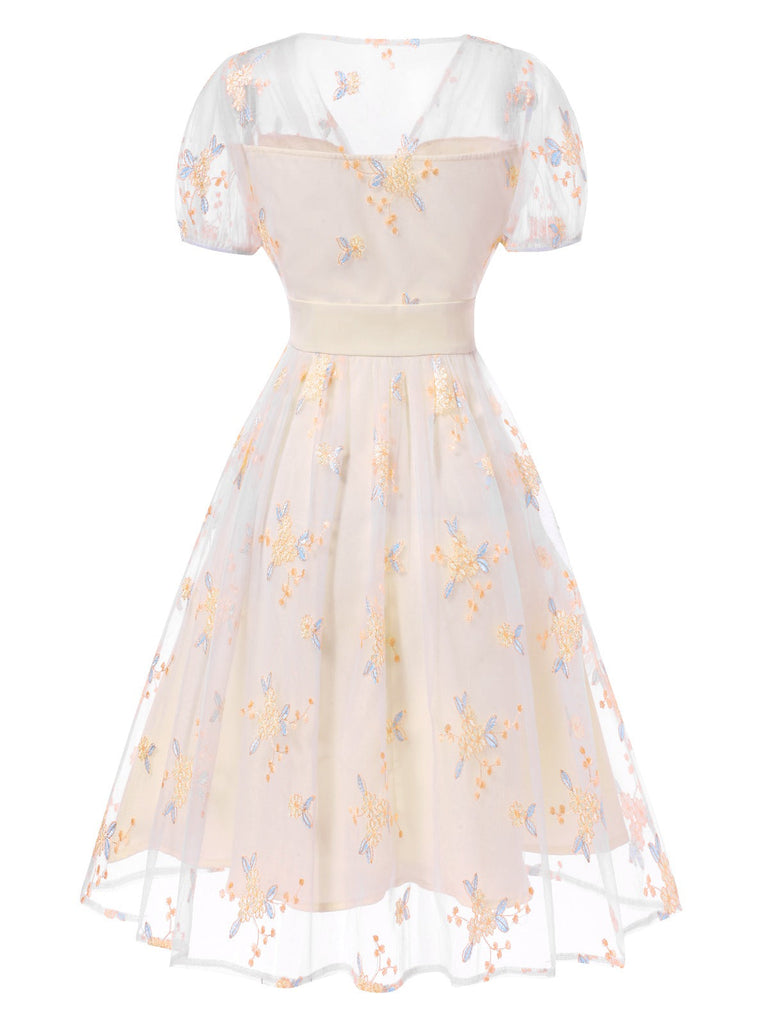 Abito ricami floreale scollo a V profondo bianco anni '50