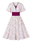 Abito floreale con maniche a campana rosa anni '50