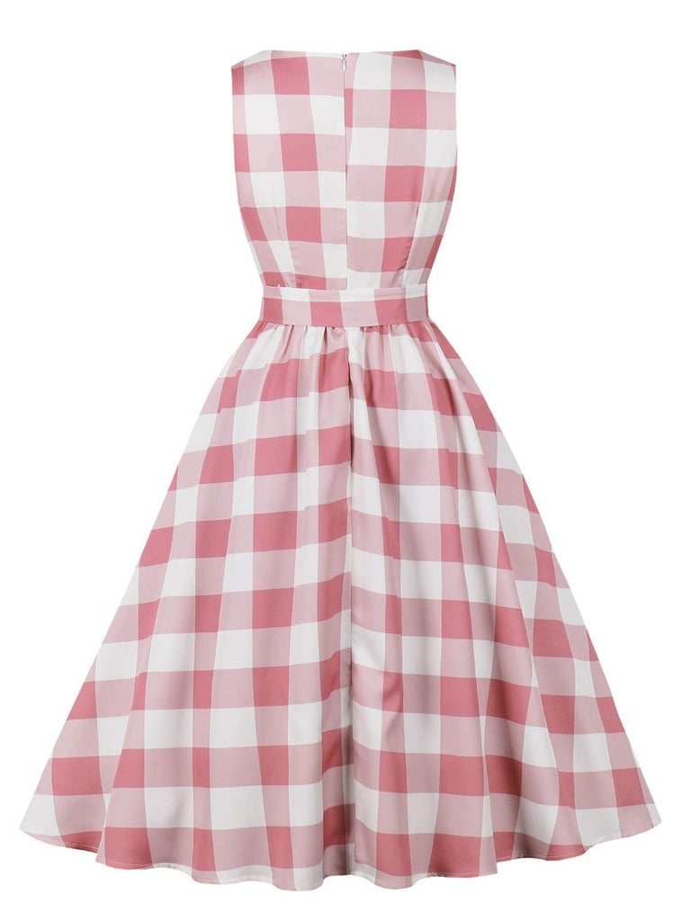 Abito a quadri con bottoni e fiocco rosa anni '50