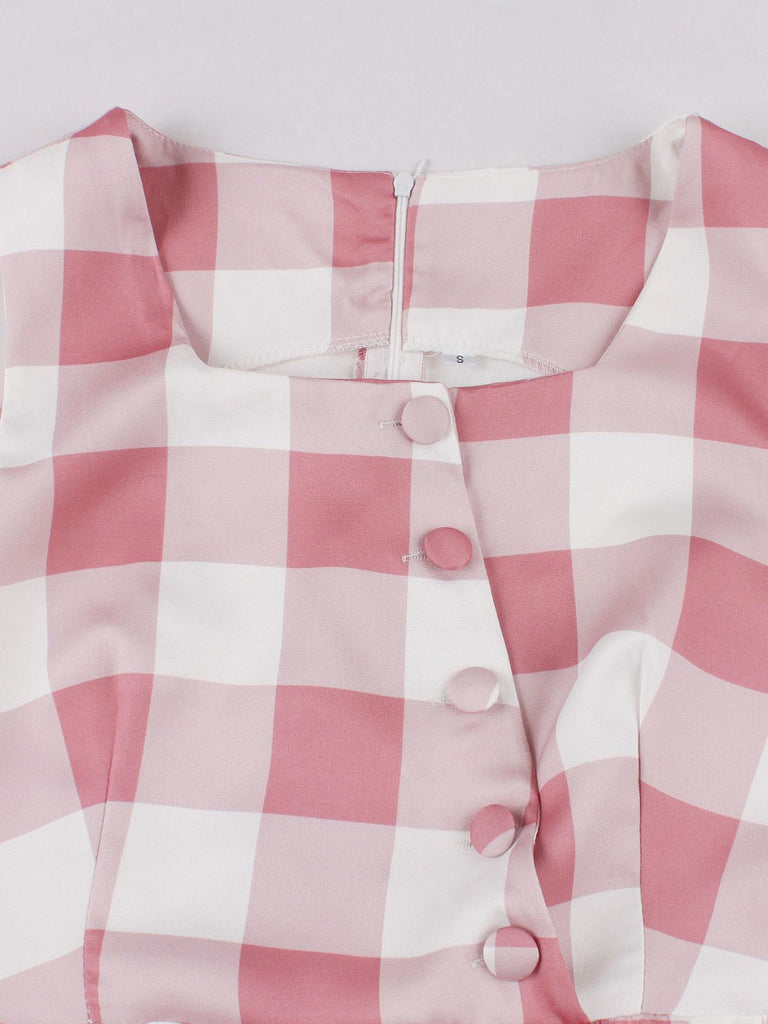 Abito a quadri con bottoni e fiocco rosa anni '50