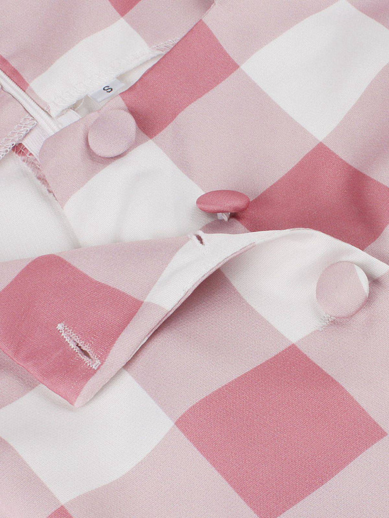 Abito a quadri con bottoni e fiocco rosa anni '50