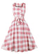 Abito a quadri con bottoni e fiocco rosa anni '50