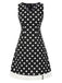 Abito a pois con scollo a V nero anni '60