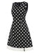 Abito a pois con scollo a V nero anni '60