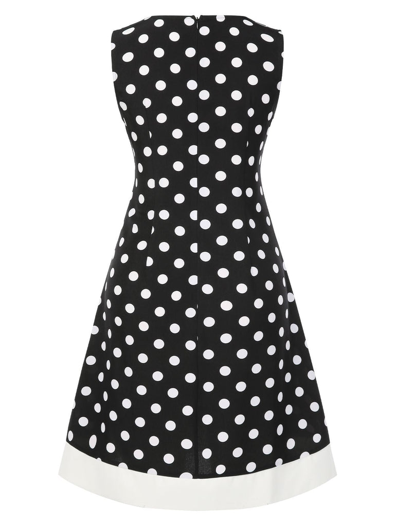 Abito a pois con scollo a V nero anni '60