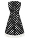 Abito a pois con scollo a V nero anni '60