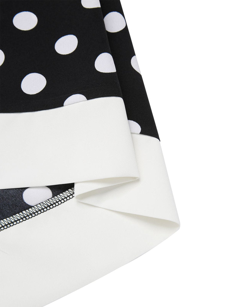 Abito a pois con scollo a V nero anni '60